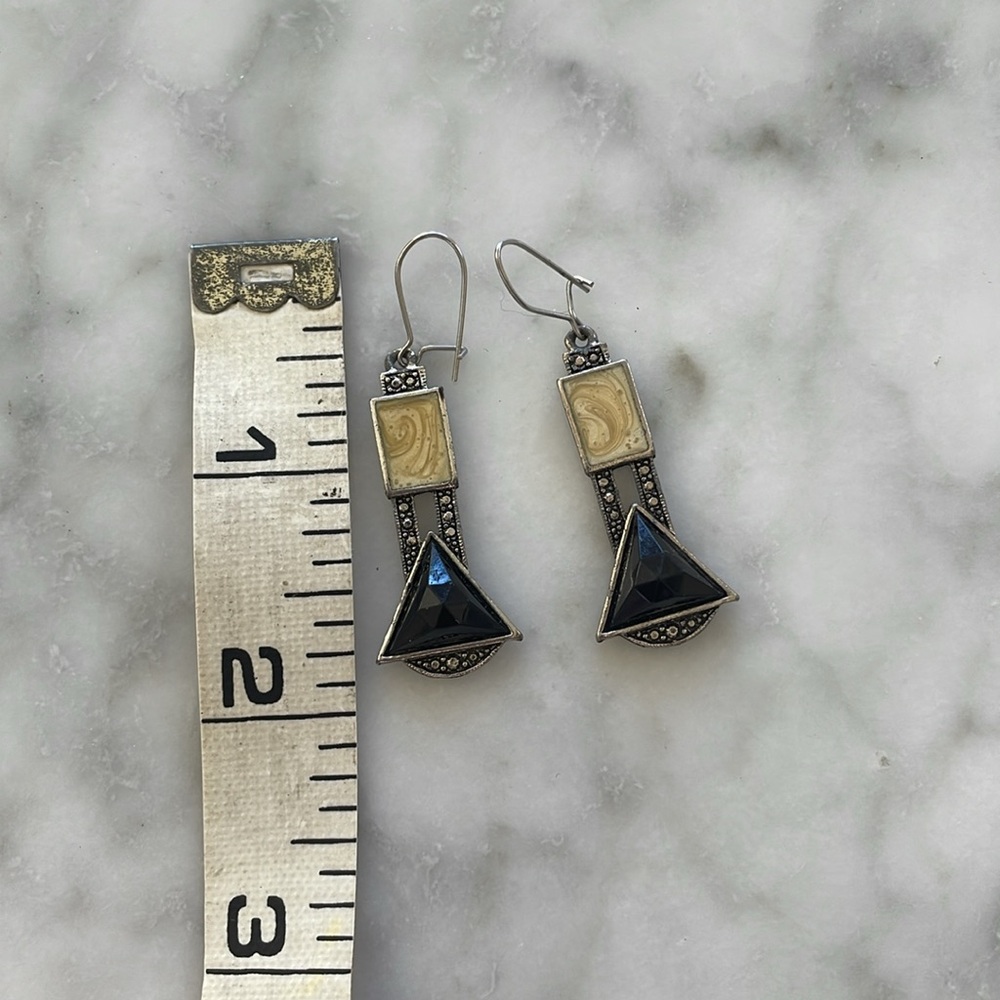Black and ivory stone drop earrings.
